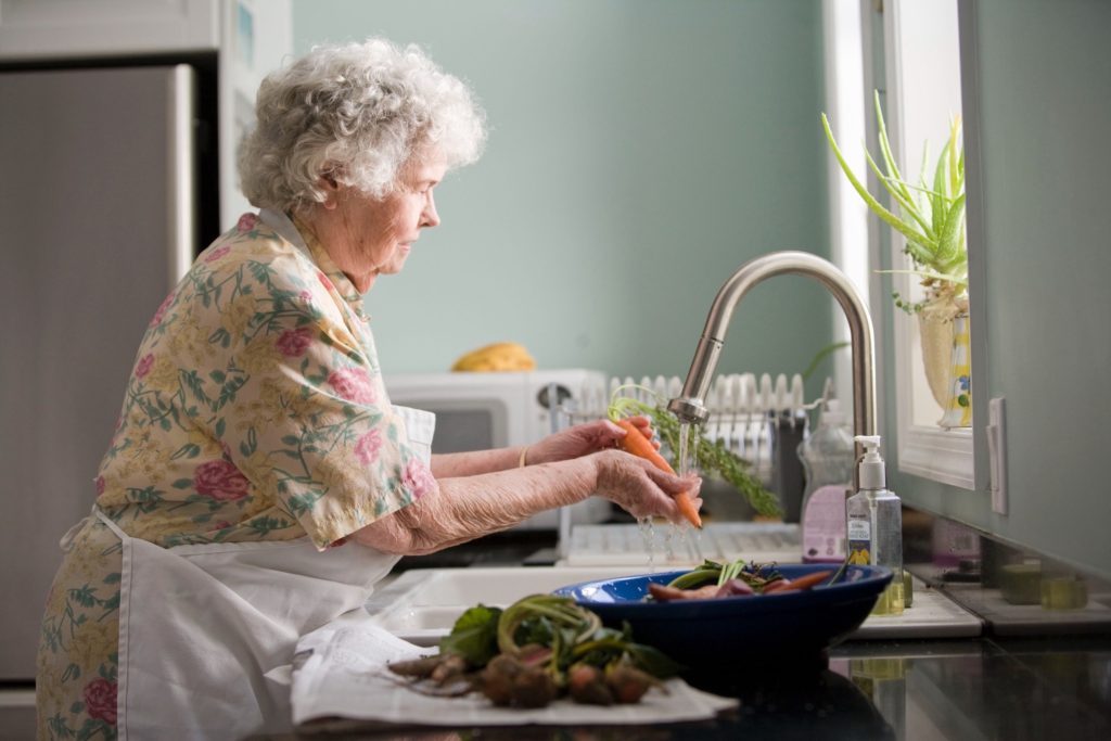 Elderly woman in retirement home